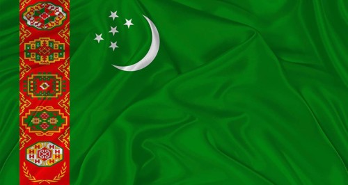 Flag of Turkmenistan with cloth texture. Close up of Turkmenistan flag waving