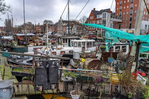 Houseboats on a canal in Groningen, Netherlands