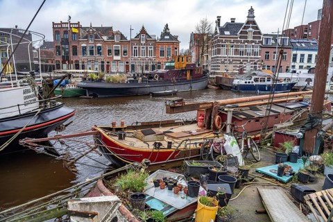 Houseboats on a canal in Groningen, Netherlands