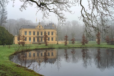 Park and pond at Nienoord Castle in Leek, Groningen, Netherlands