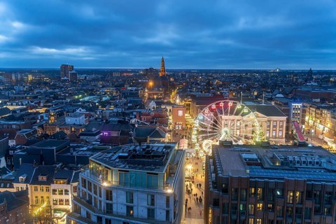 Groningen with the Ferris wheel on the Grote Markt seen from above at dusk, Netherlands