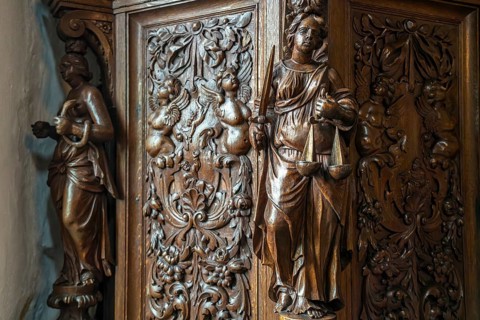Detail of the wood-carved pulpit in the church of Midwolde, Groningen, Netherlands