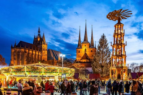 Christmas market with Christmas pyramid in front of Erfurt Cathedral and the Church of St Severus