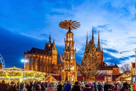 Christmas market with Christmas pyramid in front of Erfurt Cathedral and the Church of St Severus