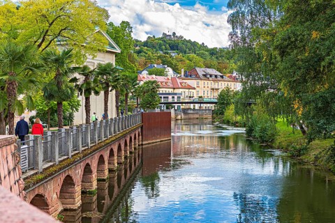 Promenade and arcade footbridge on the Franconian Saale in Bad Kissingen, Bavaria, Germany