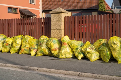 Yellow bags for plastic waste at the roadside, waste separation, Bad Staffelstein, Upper Franconia,