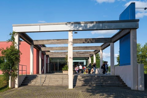 Teenagers leaving the indoor swimming pool, Aqua Riese, Bad Staffelstein, Upper Franconia,