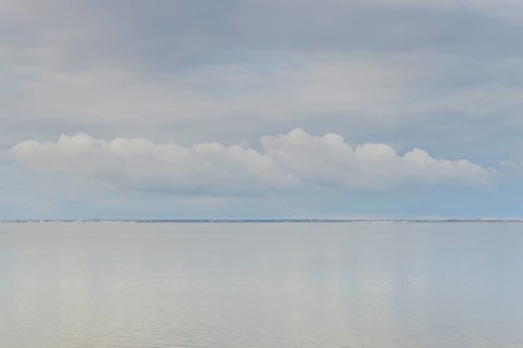 North Sea coast, special light mood over the Wadden Sea with rising water and calm wind, on the
