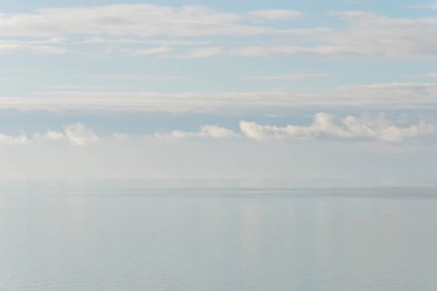 North Sea coast, special light atmosphere over the Wadden Sea with rising water and calm wind,