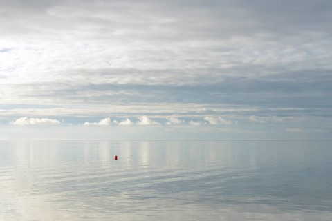 North Sea coast, special light atmosphere over the Wadden Sea with rising water and calm wind, red