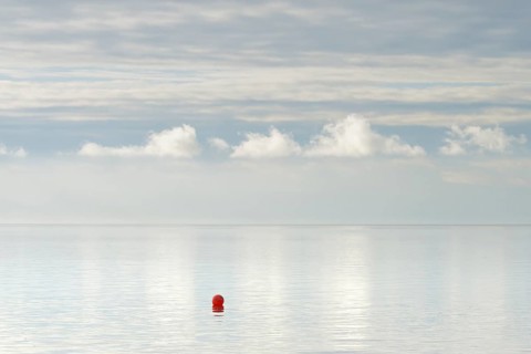 North Sea coast, special light atmosphere over the Wadden Sea with rising water and calm wind, red
