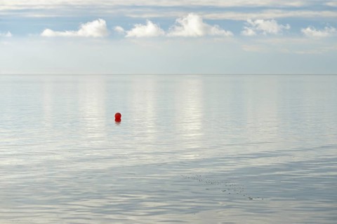 North Sea coast, special light atmosphere over the Wadden Sea with rising water and calm wind, red
