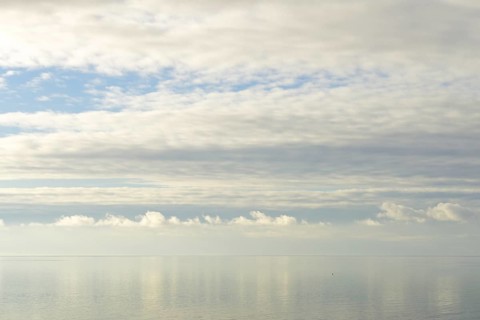 North Sea coast, special light atmosphere over the Wadden Sea with rising water and calm wind,