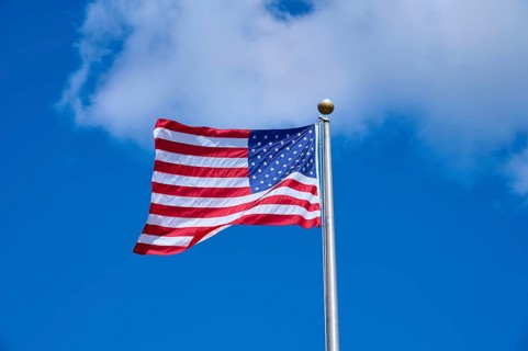 The American national flag flutters vividly under a sunny sky, Flamingo, Everglades National Park,
