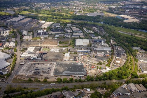 Aerial view, construction site harbour centre after real market fire, industrial area at Weseler
