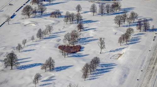 Aerial view, heart-shaped bushes in a winter landscape in the golf course of Raffelberg racecourse,