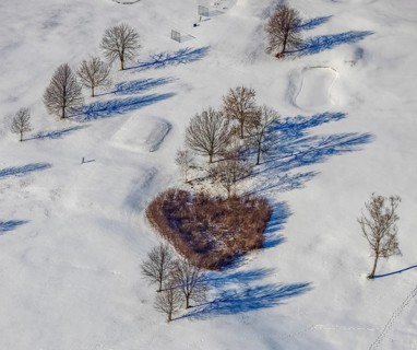 Aerial view, heart-shaped bushes in a winter landscape in the golf course of Raffelberg racecourse,