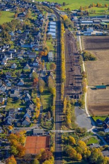 Aerial view, sawmill timber yard at the railway embankment in the district Wennemen in Meschede,