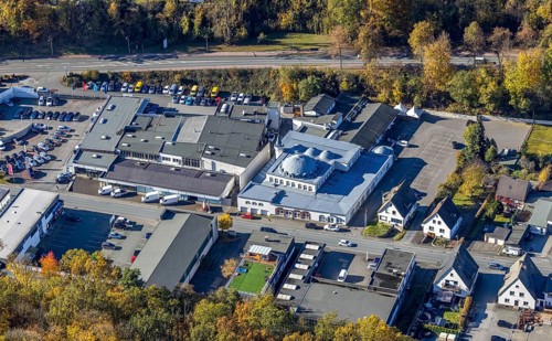 Aerial view, Fatih Mosque and Hoffmann car dealership in Meschede town in Meschede, Sauerland,