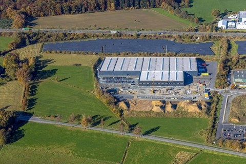 Aerial view, Brilon lights with solar park in the Enste industrial estate on the A46 motorway in