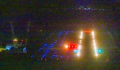 Aerial photo, Marl Loemühle airfield, night approach to the runway with PAPI, runway lighting,