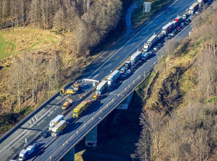 Aerial view, truck traffic jam on the Sterbecke viaduct in front of the closed Rahmede viaduct of