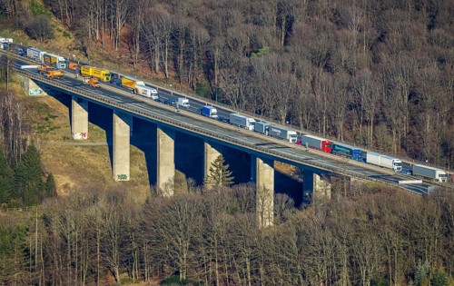 Aerial view, truck traffic jam on the Sterbecke viaduct in front of the closed Rahmede viaduct of