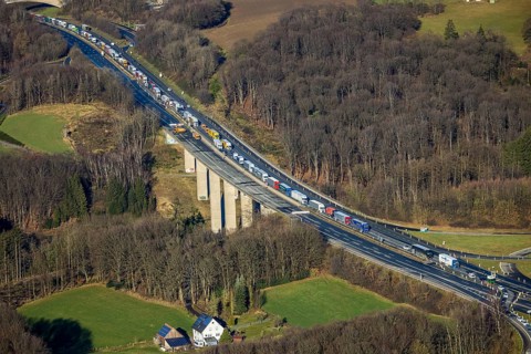 Aerial view, truck traffic jam on the Sterbecke viaduct in front of the closed Rahmede viaduct of