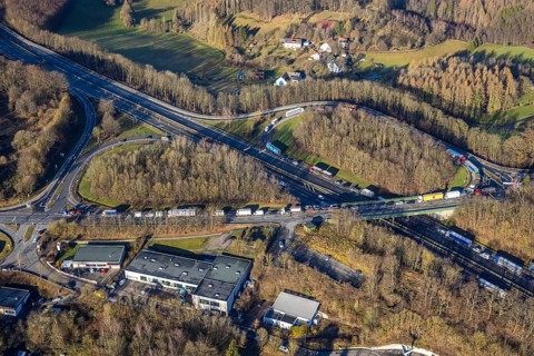Aerial view, truck traffic jam at the Lüdenscheid exit of the A45 Sauerlandlinie motorway due to