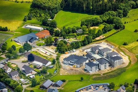 Aerial view, new senior-friendly residential complex WohnGut, spa and community centre, natural