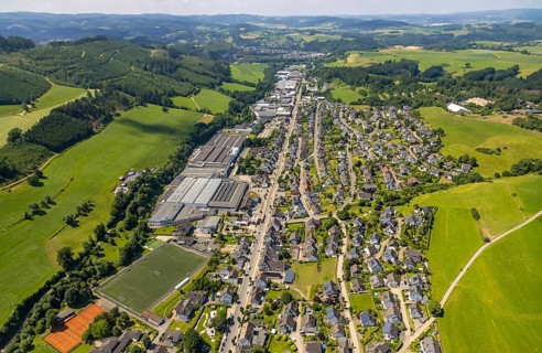 Aerial view, aerial view Elspe with commercial area Bielefelder Straße and sports field Elspe,