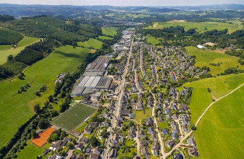 Aerial view, aerial view Elspe with commercial area Bielefelder Straße and sports field Elspe,