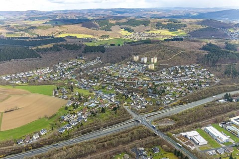 Aerial view, Hüttentalstraße and district Buschhütten, Kreuztal, Sauerland, North Rhine-Westphalia,