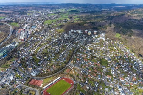 Aerial view, view of Kreuztal and Stählerwiese stadium, roundabout and construction site