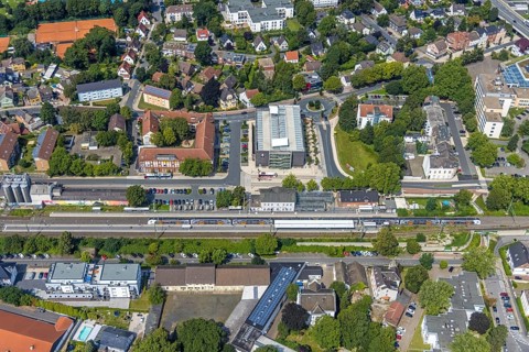 Aerial view, Kamen railway station with multi-storey car park and building of the Unna district