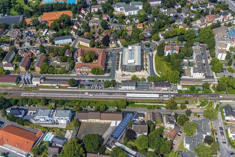 Aerial view, Kamen railway station with multi-storey car park and building of the Unna district