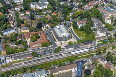 Aerial view, Kamen railway station with multi-storey car park and building of the Unna district