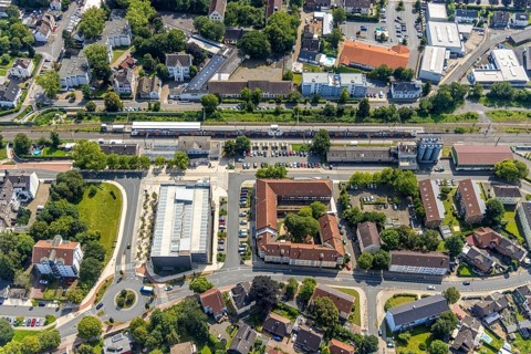 Aerial view, Kamen railway station with multi-storey car park and building of the Unna district
