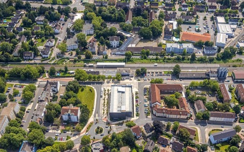 Aerial view, Kamen railway station with multi-storey car park and building of the Unna district
