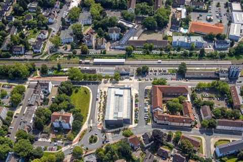 Aerial view, Kamen railway station with multi-storey car park and building of the Unna district
