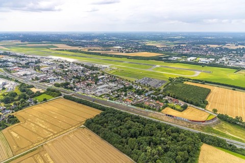 Aerial view, Dortmund Airport, residential area and commercial area Chaussee with noise protection