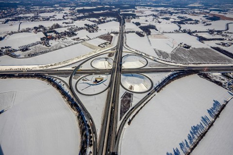 Aerial view, Kamen junction in winter, A1 and A2, helicopter sculpture Yellow Angel, Kamen, Ruhr