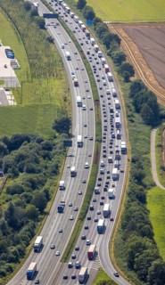 Aerial photo, traffic volume on the A1 motorway in Südkamen, truck traffic jam, Kamen, Ruhr area,
