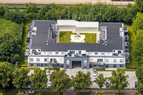 Aerial view, Am Bahnhof Holzwickede, new residential and commercial building in Bahnhofstraße with