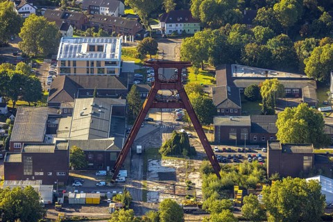 Aerial view, industrial estate Wilhelmstraße with winding tower of the former Pluto colliery in the