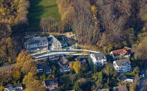 Aerial view, construction site and new building for a Waldorf kindergarten on Bergweg in the