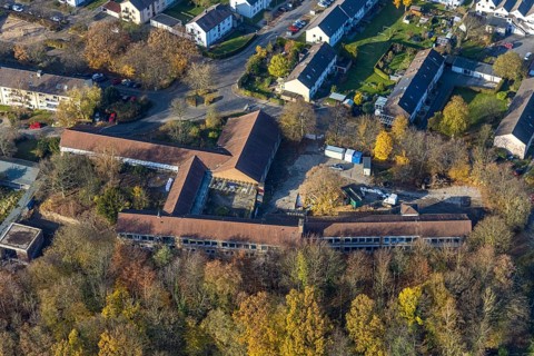 Aerial view, demolition work of the former primary school in the village for the construction of a