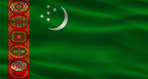Turkmenistan flag with fabric texture. Realistic flag of Turkmenistan waving