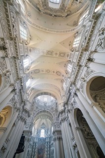 Impressive baroque church architecture with ornately decorated ceiling in the interior, Munich,
