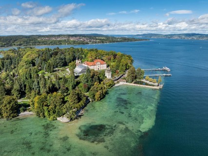 The island of Mainau in Lake Constance with the jetty and the baroque Mainau Castle, built between